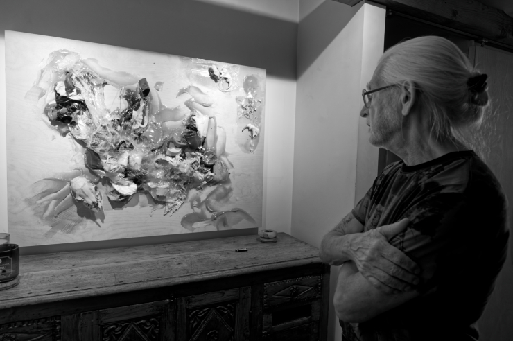 “This is the first piece I made after Ruth left, when I was trying to deal with the transition of her not being here anymore. She would use half a container of paint and then she’d want to get more paint. So after she was gone, I let all of the paint jars and holders dry out and then peeled the paint out of it. I called it ‘Ruth’s Remnants,’ and it includes broken glass. The intention was to show how I was emotionally breaking up and trying to put myself back together through using her physical materials. So there’s a fair amount of emotion in here.” Photo: Carl Glassman/Tribeca Trib